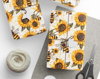 Papier cadeau avec tournesols et abeilles, cet emballage cadeau floral est disponible en 3 tailles et 2 finitions, un emballage parfait pour tout cadeau printemps-été !