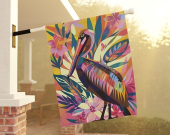 May include: A colorful geometric illustration of a pelican with tropical foliage and flowers. The pelican is brown with pink, blue, and yellow accents. The background is yellow with pink, blue, and green accents.