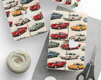 May include: Gift wrap featuring a repeating pattern of classic sports cars in various colors, including red, green, and yellow, on a cream background. The wrapped gifts are tied with twine and adorned with decorative tags. A ball of twine and scissors are also present.