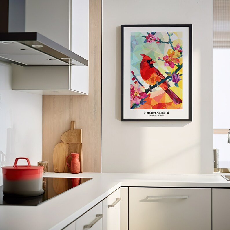 May include: A framed print of a colorful geometric illustration of a Northern Cardinal perched on a branch with pink flowers. The text "Northern Cardinal" and "Cardinalis Cardinalis" is below the image.