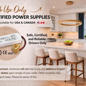 May include: An image showcasing a white power supply with the text "CERTIFIED POWER SUPPLIES" and "Suitable for USA & CANADA". The image also includes a modern kitchen with a circular light fixture.