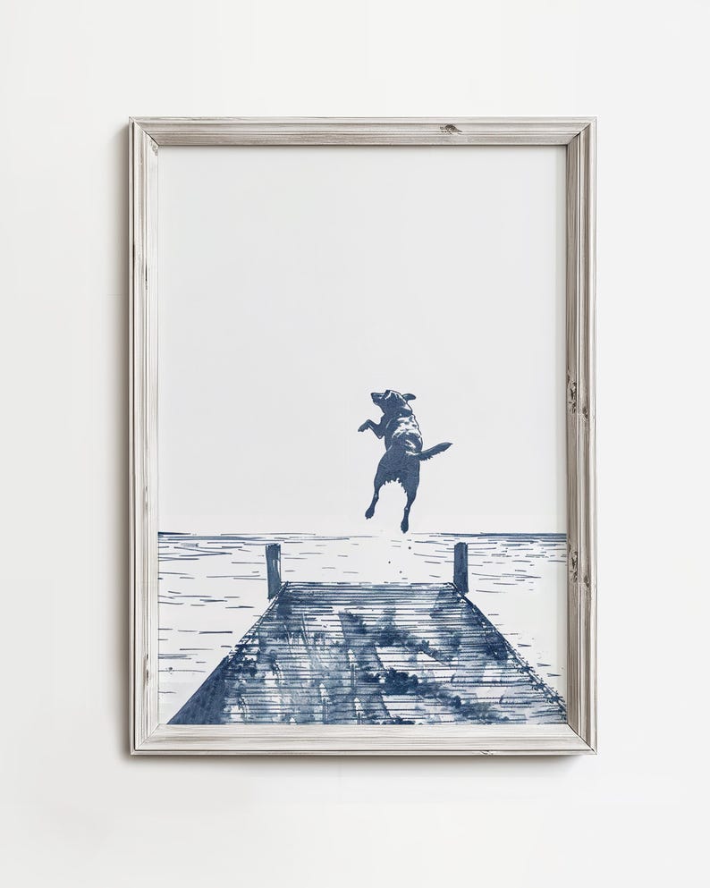 a picture of a dog jumping into the water