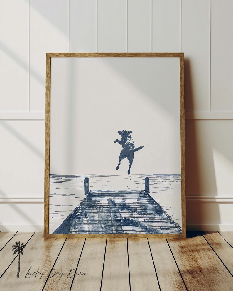 a picture of a dog jumping into the water