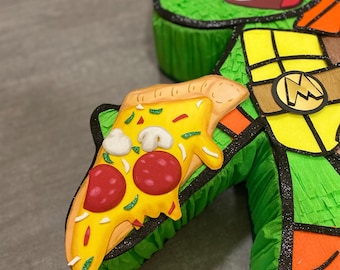 Piñata Tortuga Ninja con pizza