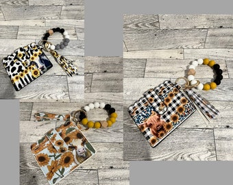 Wristlet wallets, beaded wristlets