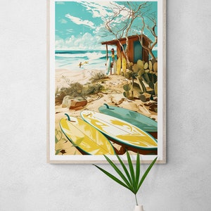 May include: A framed illustration of a beach scene with a small wooden shack, palm trees, and three yellow surfboards lying on the sand. The sky is blue with white clouds and the ocean is turquoise.