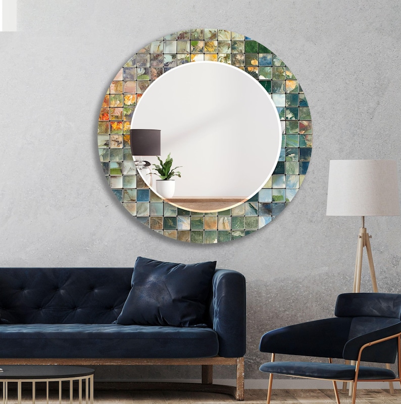 a living room with a blue couch and a round mirror