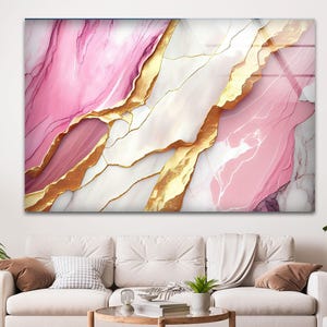 Cuadro de pared de cristal con efecto mármol rosa y diseño abstracto con vetas doradas.