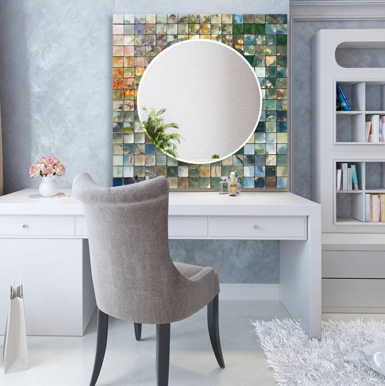 a desk with a chair and a mirror on it