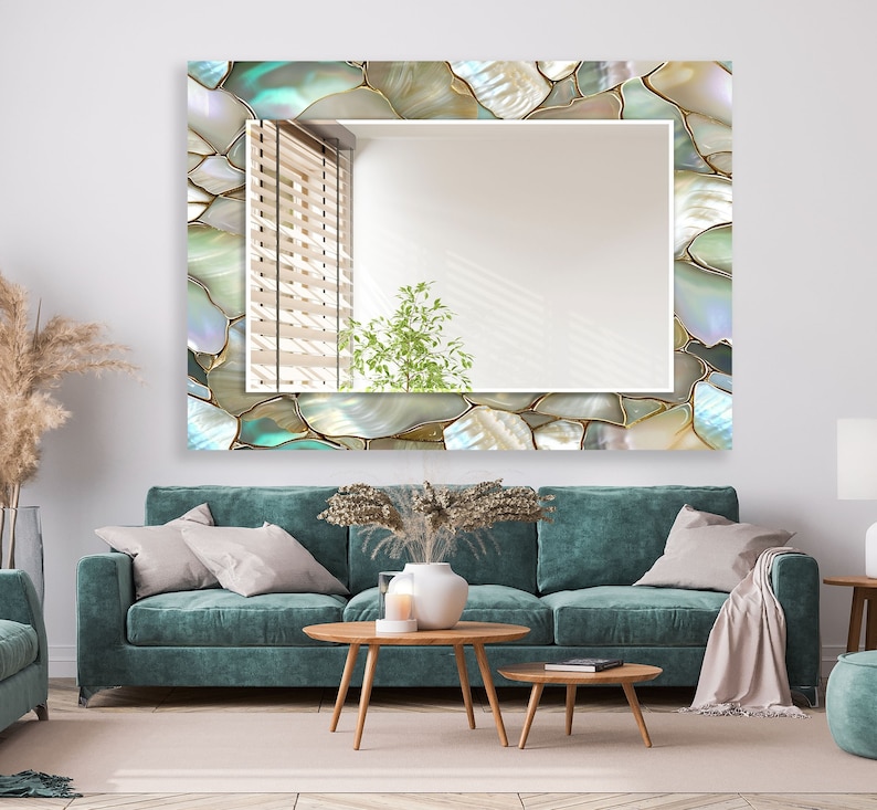 Stylish wall mirror with glossy glass frame in contemporary living space
