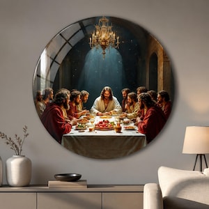 May include: A circular wall art piece depicting the Last Supper, featuring a central figure in white robes surrounded by twelve individuals in red and brown garments at a long table, illuminated by a golden chandelier in a stone hall.