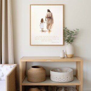 May include: A watercolor painting of a man and a young girl walking hand-in-hand. The man is wearing a long robe and the girl is wearing a dress. The text "FOR I KNOW THE PLANS I HAVE FOR YOU DECLARES THE LORD, PLANS TO PROSPER YOU AND NOT TO HARM YOU, PLANS TO GIVE YOU HOPE AND A FUTURE JEREMIAH 29:11" is written below the image.