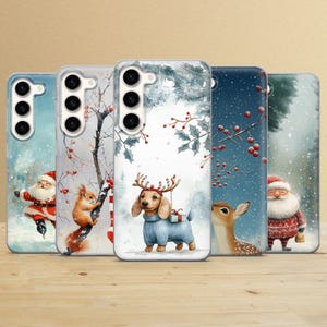 May include: Set of five phone cases featuring a winter holiday theme. The cases are decorated with illustrations of a squirrel, a dachshund, a deer, and a Santa Claus. The cases are all white with a wintery background.