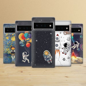 May include: Five different phone cases with space-themed designs. The cases feature astronauts, planets, stars, rockets, and a starry night sky.