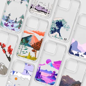 May include: A white ceramic mug with a black handle and the text "But First, Coffee" in a bold, black font. The mug is set against a blurred background, suggesting a cosy setting.