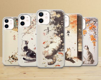 May include: Five clear phone cases featuring artistic illustrations of cats in various poses. The designs include cats sitting or lying down amidst cherry blossoms, falling petals, and small goldfish, with black Japanese calligraphy characters.