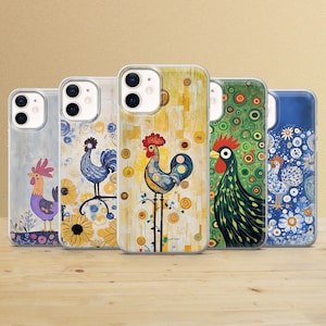 May include: Five clear smartphone cases featuring rooster illustrations. The designs include a purple rooster on a gray background, a blue rooster with yellow flowers, a central rooster on yellow, a green rooster with circles, and a blue floral pattern.
