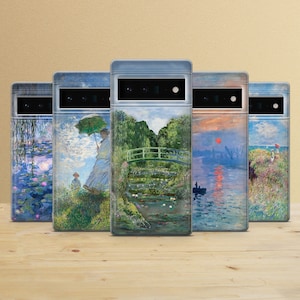 May include: Five different phone cases with various famous paintings printed on them. The cases are all black and have a clear plastic back that shows the image. The paintings include a bridge over a pond, a woman with an umbrella, a sunset over water, a field of water lilies, and a seascape.