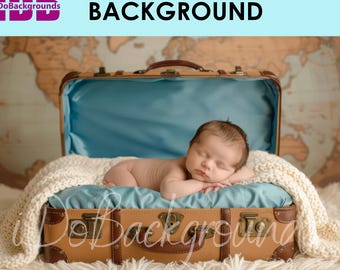 May include: A newborn baby rests peacefully inside a vintage suitcase, nestled on a soft, cream-colored blanket. The suitcase is brown with brass hardware and a blue interior. The background features a world map. Text reads "NEWBORN BACKGROUND".
