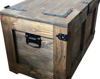 Rustic wooden chest on wheels, 80 cm. Wooden trunk with metal elements. Coffee table with chest, table in vintage style