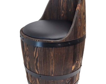 A barrel-shaped armchair for a wine lover. Wenge colored barrel seat for home bar. Brushed wood, visible wood grain