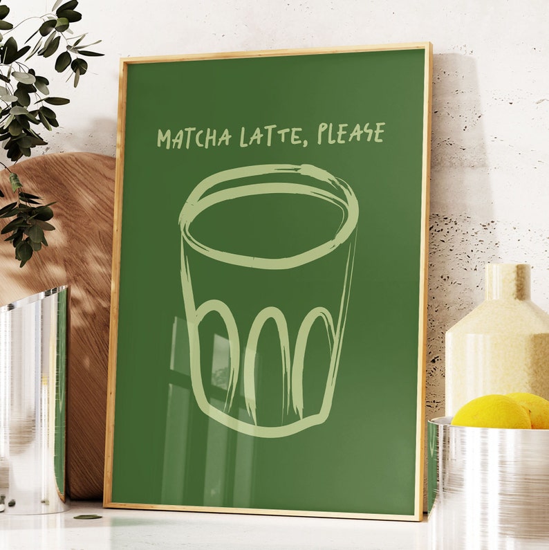 May include: A green poster with a white outline of a glass of matcha latte and the text "MATCHA LATTE, PLEASE".