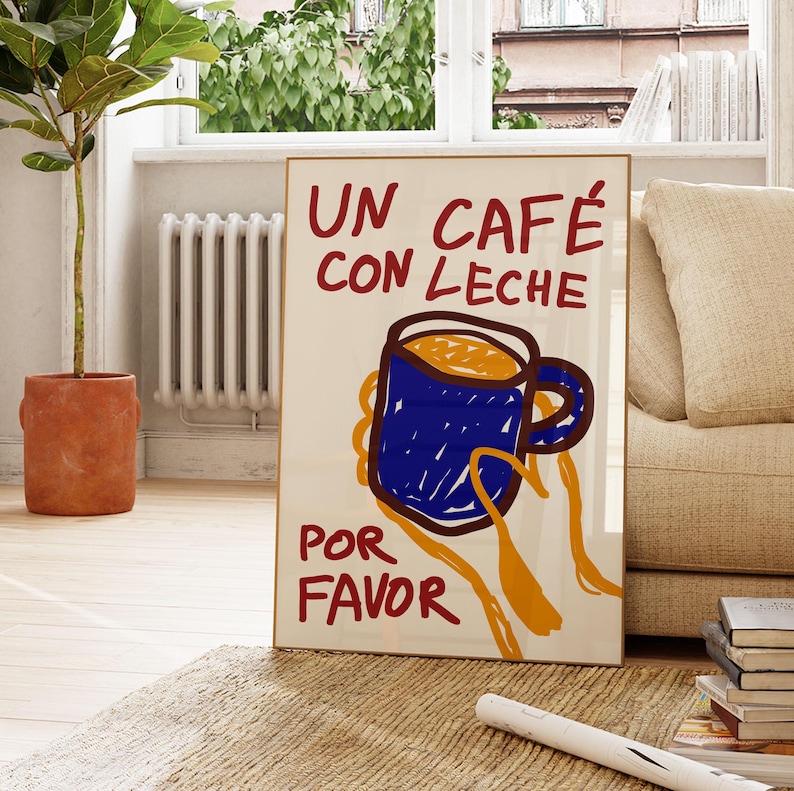 以下が含まれることがあります： 赤い文字と黄色の文字で「UN CAFE CON LECHE POR FAVOR」と書かれた白いポスター。青いコーヒーカップを持った手が描かれている。