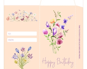 May include: Printable DIY birthday money envelope with a floral design. The envelope has a pink background with a floral pattern and the words "Happy Birthday" in purple text. The envelope is ready to be cut out and assembled.