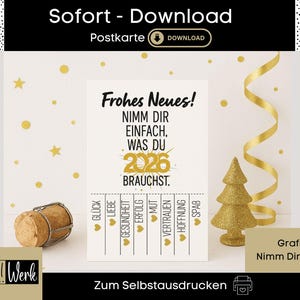 May include: A white postcard with the text "Frohes Neues!" and "Nimm Dir einfach, was du brauchst. 2026". Gold accents include stars, a Christmas tree, and a ribbon. A champagne cork sits to the left.