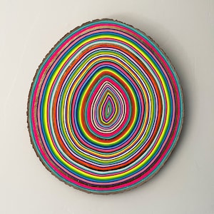 Colorful painting on wood slice