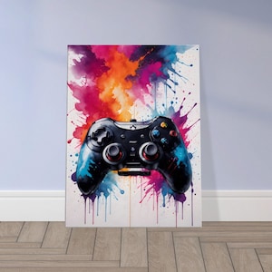 Op de afbeelding: Een zwarte videogamecontroller met kleurrijke aquarelspatten op de achtergrond. De controller heeft rode en blauwe knoppen en een zwart-wit ontwerp.