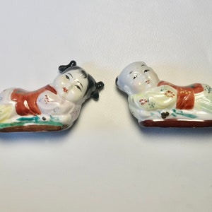 Pareja de almohadas chinas en miniatura
