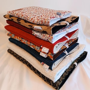 Book pouch with button closure