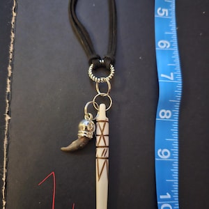 Coyote and bobcat claw and tooth chokers and necklaces