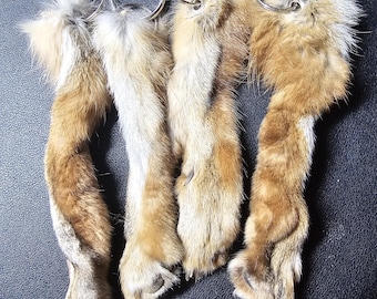 Soft tanned grey fox paw keychains