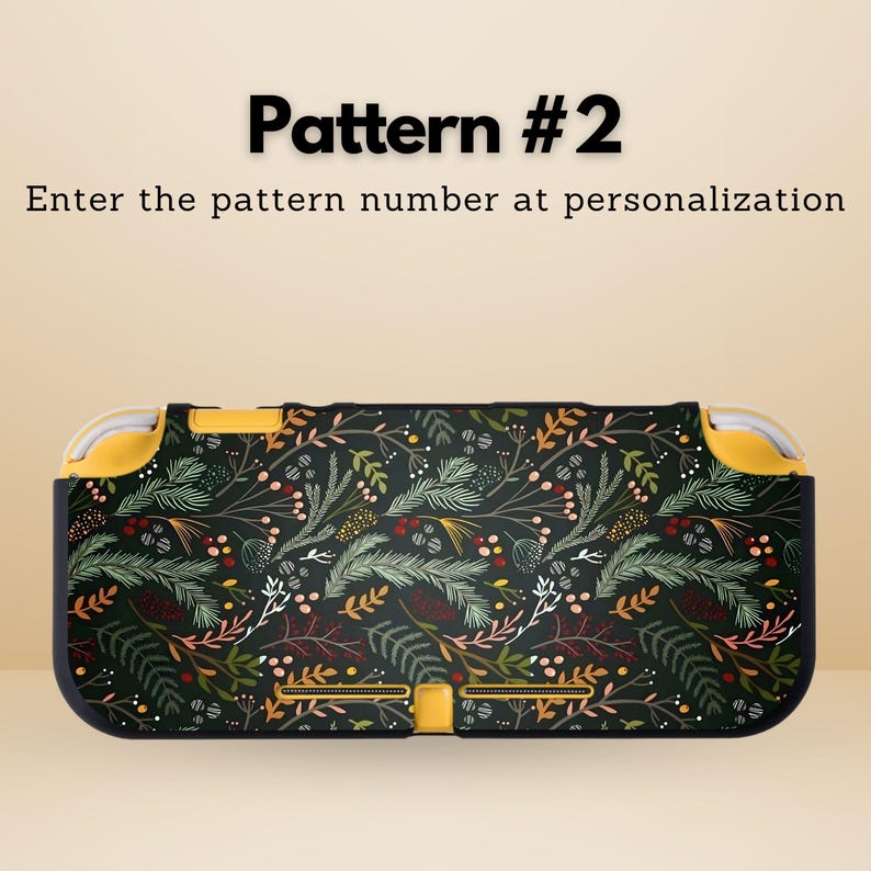 May include: A black and yellow patterned case for a handheld gaming device. The case features a botanical design with green, white, and red accents. The text "Pattern #2" and instructions are visible on the image.