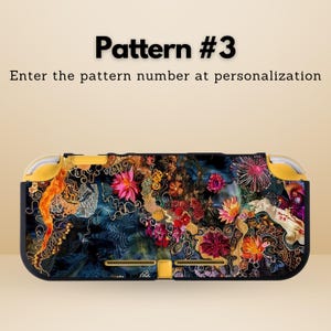 May include: A black and yellow handheld gaming console case with a floral pattern. The case features a dark blue background with gold, pink, and red floral designs. The text "Pattern #3" and instructions are visible.