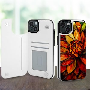 May include: Two phone cases, one white leather wallet style and one with a vibrant flower design. The flower design features red, orange, and yellow hues. The cases are displayed on a wooden surface.