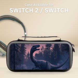 May include: Black case for Switch 2 / Switch featuring a dinosaur illustration. The case has a zip closure and a black and white design. The text "Case Available for SWITCH 2 / SWITCH" is at the top. Headphones are visible in the background.