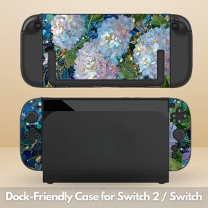 May include: A black dock-friendly case for a Switch 2 / Switch, featuring a floral design with blue, purple, and gold accents. The case has a vibrant pattern of hydrangea flowers and green leaves. The text "Dock-Friendly Case for Switch 2 / Switch" is at the bottom.
