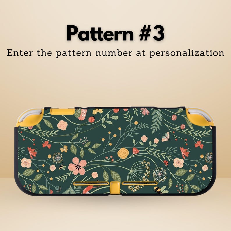 May include: A dark green patterned case for a handheld gaming device. The case features a floral design with pink, yellow, and white flowers, butterflies, and bees. The text "Pattern #3" and "Enter the pattern number at personalization" are visible.