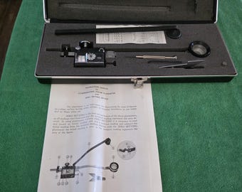 THS Planimeter model 55-8427 plan measuring kit with manual instructions, misc. attachments and factory case.