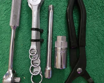 SK tools & Fuller misc. wrenches. 3/8" drive SAE misc. tools, socket, extension and Ratchet. Oil filter tool. Most of the tools made in USA.