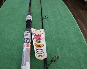 Shakespeare Ugly Stik spinning model SPL 1102  5' 10" medium action Backpack 2 piece fishing rod. New/Old Stock fishing rod.
