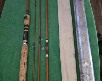 Wright Mc Gill "Trailmaster" No.4TMU 7' 6" spin/fly backpack 4 pc. fishing rod with aluminum carrying case.