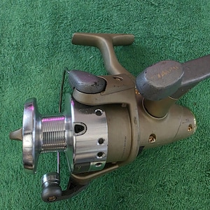 Moulinet De Pêche Vintage Quantum Heat HT1 - Spinning - Eau Douce Et Mer - état Fonctionnel