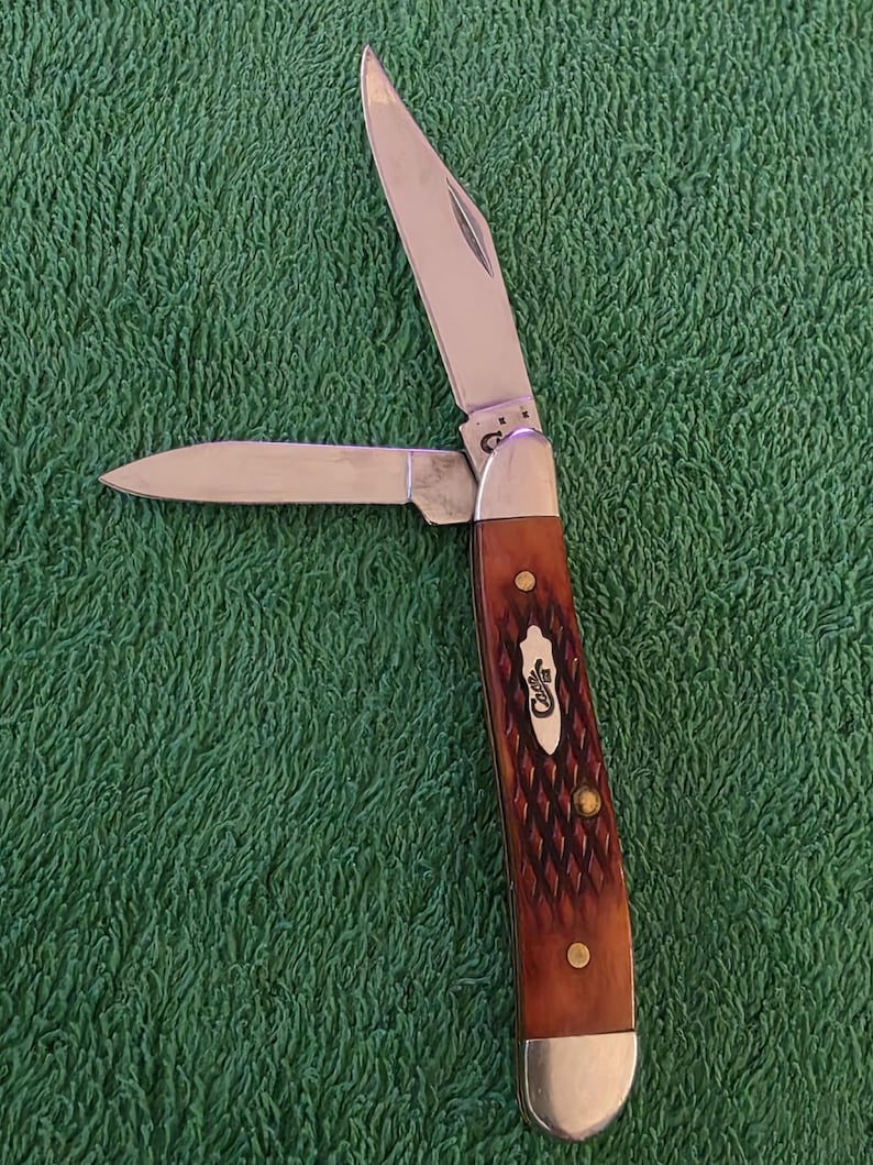 May include: A set of three ceramic mugs with a speckled, matte finish. Each mug features a different color: light blue, cream, and gray. The mugs have a simple, modern design and a comfortable handle.