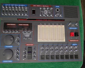 Radio Shack Science Fair 300-in-1 Electronic Project Kit with manual instructions, misc. testing parts and factory box. Kit is (Untested).