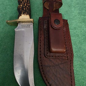 Schrade collectors 1970's No.171UH hunting knife 5-1/2", bone style handle, sharpening sanding stone & leather sheath. The knife's #35597. immagine 9