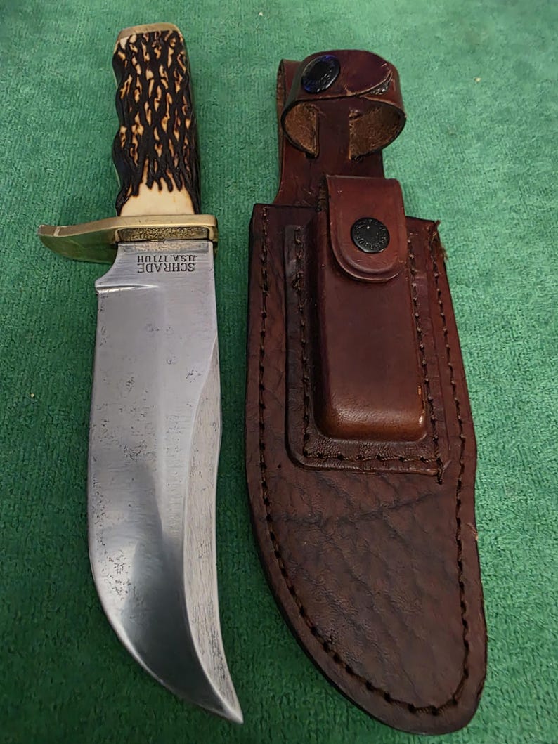 Schrade collectors 1970's No.171UH hunting knife 5-1/2", bone style handle, sharpening sanding stone & leather sheath. The knife's #35597. immagine 9